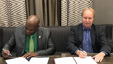DCSLL CEO Signing Agreement