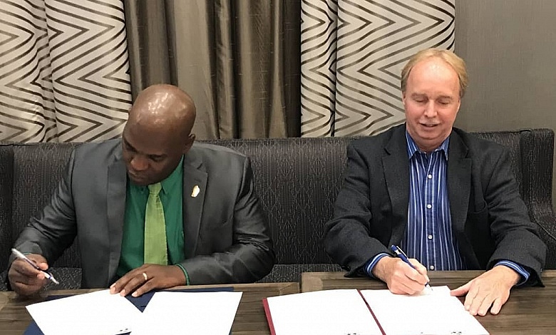 DCSLL CEO Signing Agreement