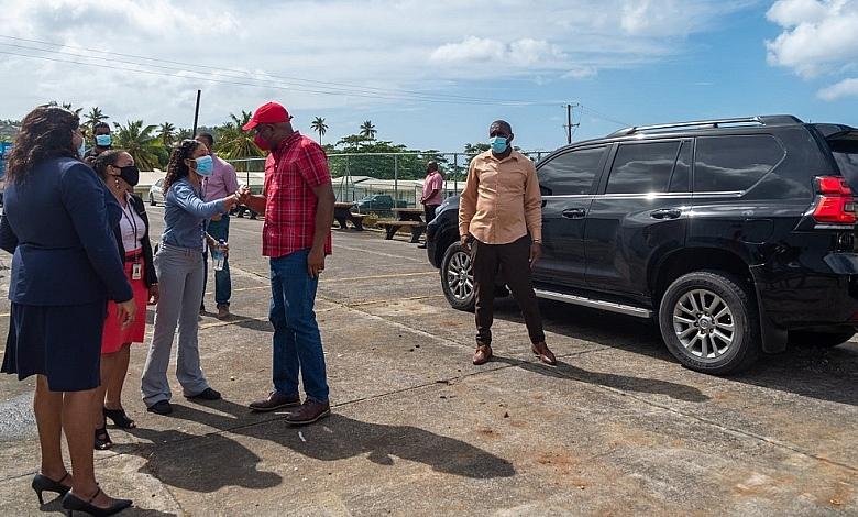 Hon. Roosevelt Skerrit with Clear Harbor Staff