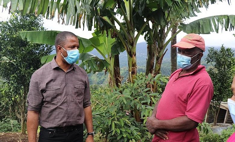 Fidel Grant With Farmer