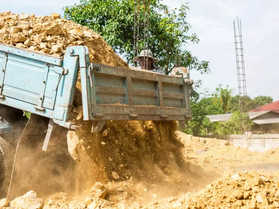 Truck Pouring Gravel Stone