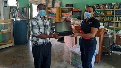 Harris Paints Sales Manager with Technical Teacher at Pierre Charles Secondary School