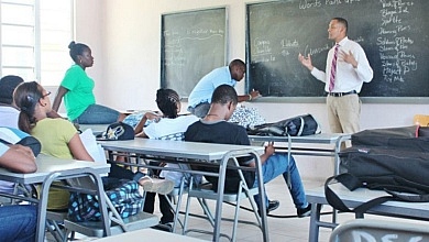 Dominica State College Students Class With Teacher