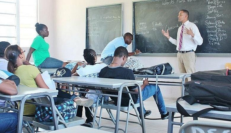 Dominica State College Students Class With Teacher