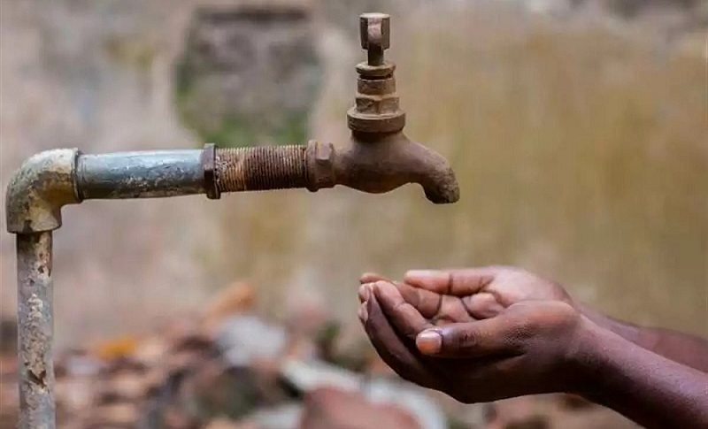 Hands Cupped Under Water Tap