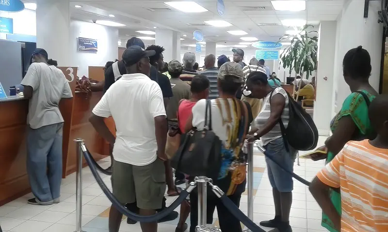 Customers Standing in Line at NCCU Office