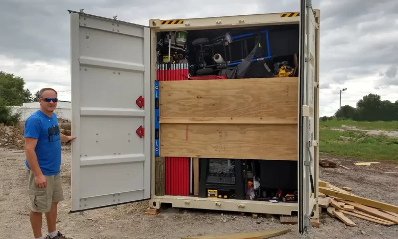 Jason Grogg Standing with Container