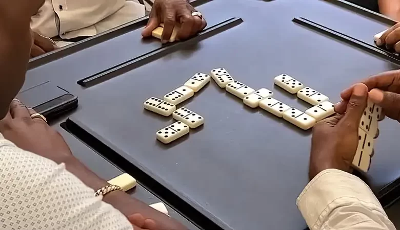 Dominoes Being Played