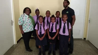 Mr. Kyle Francis with Newtown Primary School Students