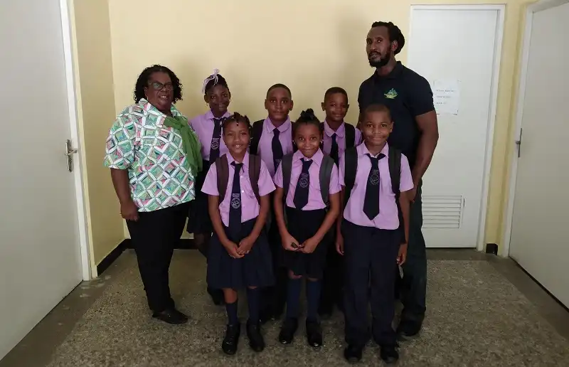 Mr. Kyle Francis with Newtown Primary School Students