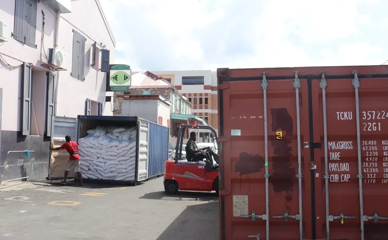 DEXIA Sugar Import Dominica